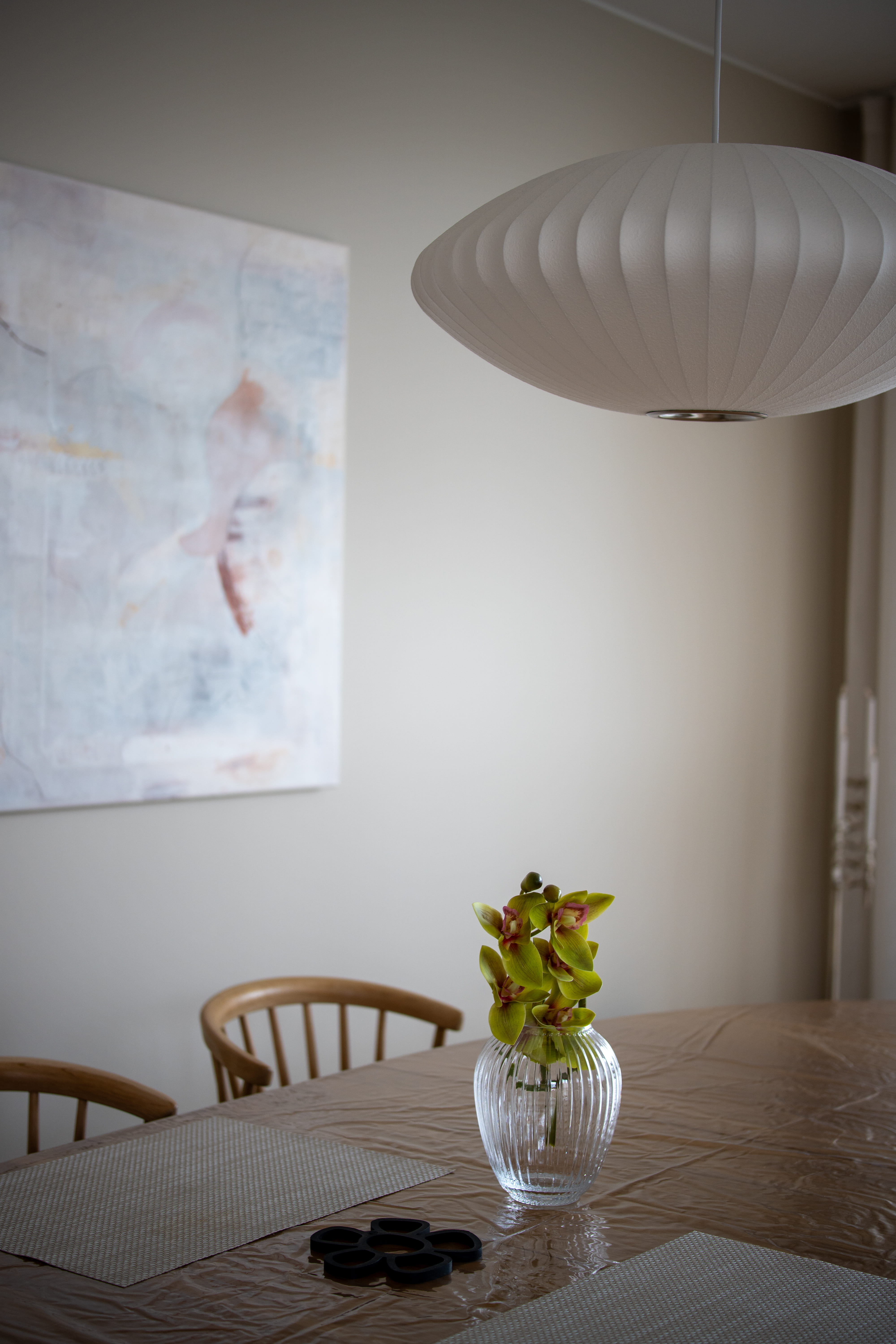 kitchen table with flowers on the table in natural light
